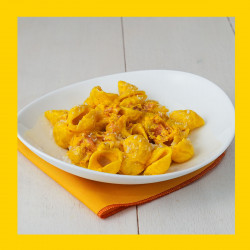 Conchiglie allo zafferano con speck e robiola