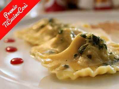Ravioli di ossobuco in pasta gialla gremolada crema di riso alla liquirizia e riduzione agrodolce allo zafferano
